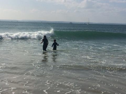 The only picture of the seafront I had - Polly and Ollie braving rare breakers on the harbour side of the sand bar.